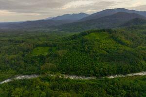 the beauty of the morning panorama with sunrise in indonesia village photo