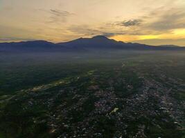 the beauty of the morning panorama with sunrise in indonesia village photo