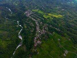 the beauty of the morning panorama with sunrise in indonesia village photo