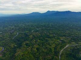 the beauty of the morning panorama with sunrise in indonesia village photo