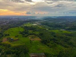 the beauty of the morning panorama with sunrise in indonesia village photo