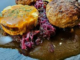 Fried meatballs with cabbage and parsley potatoes photo