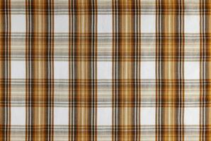 Orange checkered texture fabric, tartan pattern background. photo