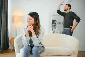 Drunk and aggressive boyfriend yelling at his girlfriend photo