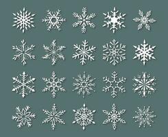 Set of hand drawn graphic snowflakes. Modern flat vector illustration. White snowflakes with shadows.