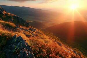 AI generated Breathtaking sunset illuminating a serene mountain landscape, highlighting the golden grass and rocky terrain. photo