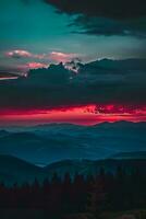 AI generated A breathtaking view of a vibrant sunset behind dark clouds, with the silhouette of distant mountains and a dense forest in the foreground. photo