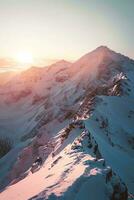 AI generated A breathtaking view of snow-covered mountains bathed in the golden light of sunrise, showcasing nature's majesty and serene beauty. photo