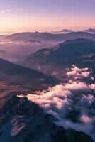 AI generated A breathtaking view of majestic mountains amidst misty clouds, illuminated by the serene light of sunrise. photo