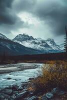 AI generated a breathtaking view of a tranquil scene featuring majestic mountains under a vibrant sunset. The rocky terrain is highlighted by the dramatic contrast photo