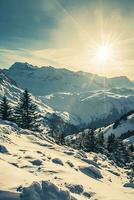 AI generated sunlit snow-covered mountains, capturing the serene and majestic beauty of a pristine winter landscape. The foreground is dominated by undisturbed snow photo