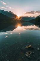 AI generated A breathtaking sunset illuminates the tranquil lake, casting reflections of the surrounding majestic mountains and serene skies. photo