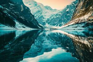 ai generado un asombroso ver de Nevado montañas reflejado en un tranquilo lago debajo un claro cielo, exhibiendo de la naturaleza majestad. foto