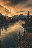 AI generated A breathtaking view of a tranquil river, surrounded by autumnal trees with the rocky mountains backdrop under a golden sunset. photo