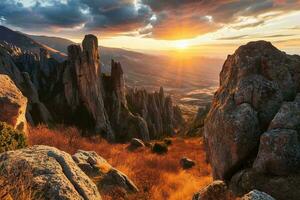 AI generated A mesmerizing sunset illuminates the rocky terrain, casting golden hues over the rolling hills and serene wilderness. photo