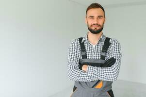 Handsome worker in empty room. photo