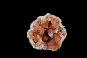 Macro mineral stone Pink Amethyst on a black background photo