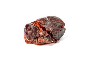 Macro mineral stone Garnet Spessartine on a white background photo