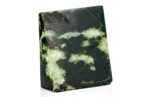 Macro stone Nephrite mineral on white background photo