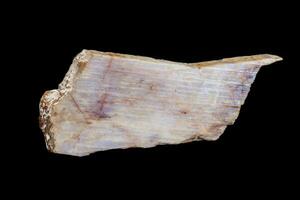 Macro of a stone mineral Moonstone on a black background photo