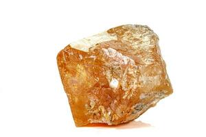 Macro stone Scheelite mineral on white background photo
