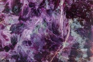 macro mineral stone Charoite on a white background photo
