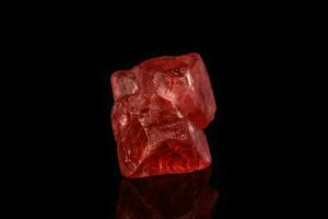 Macro mineral spinel stone on black background photo