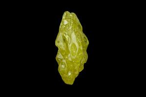 Macro mineral sulfur stone on a black background photo