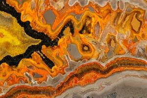 Macro mineral stone Bee jasper on a gray background photo