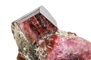 Macro mineral tourmaline stone on a white background photo