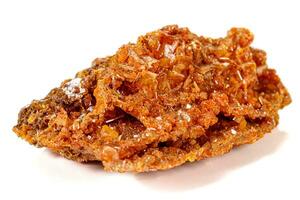 Macro stone mineral Wulfenite on a white background photo