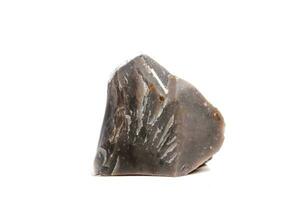 macro mineral Roca pedernal en el rock en un blanco antecedentes foto