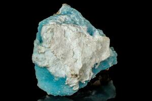 Macro stone cobalt calcite mineral on a black background photo