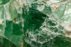 Macro stone mineral Fluorite on a black background photo