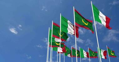 Mauritania and Italy Flags Waving Together in the Sky, Seamless Loop in Wind, Space on Left Side for Design or Information, 3D Rendering video