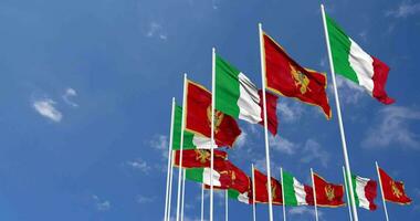 Montenegro and Italy Flags Waving Together in the Sky, Seamless Loop in Wind, Space on Left Side for Design or Information, 3D Rendering video