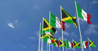 Jamaica and Italy Flags Waving Together in the Sky, Seamless Loop in Wind, Space on Left Side for Design or Information, 3D Rendering video