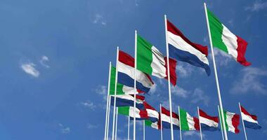 Netherlands and Italy Flags Waving Together in the Sky, Seamless Loop in Wind, Space on Left Side for Design or Information, 3D Rendering video