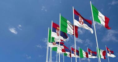 Serbia and Italy Flags Waving Together in the Sky, Seamless Loop in Wind, Space on Left Side for Design or Information, 3D Rendering video