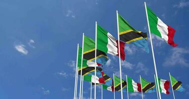 Tanzania and Italy Flags Waving Together in the Sky, Seamless Loop in Wind, Space on Left Side for Design or Information, 3D Rendering video