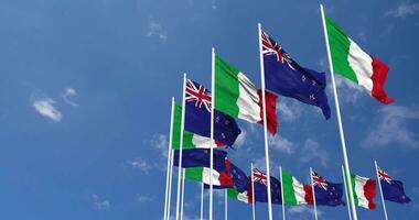 New Zealand and Italy Flags Waving Together in the Sky, Seamless Loop in Wind, Space on Left Side for Design or Information, 3D Rendering video