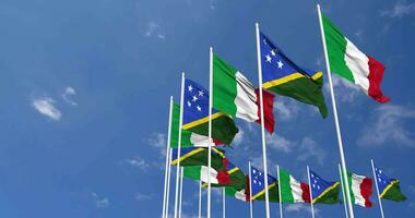 Solomon Islands and Italy Flags Waving Together in the Sky, Seamless Loop in Wind, Space on Left Side for Design or Information, 3D Rendering video