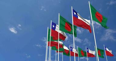 Chile and Bangladesh Flags Waving Together in the Sky, Seamless Loop in Wind, Space on Left Side for Design or Information, 3D Rendering video