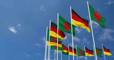 Tyskland och bangladesh flaggor vinka tillsammans i de himmel, sömlös slinga i vind, Plats på vänster sida för design eller information, 3d tolkning video