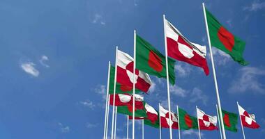 Greenland and Bangladesh Flags Waving Together in the Sky, Seamless Loop in Wind, Space on Left Side for Design or Information, 3D Rendering video