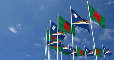 Marshall Islands and Bangladesh Flags Waving Together in the Sky, Seamless Loop in Wind, Space on Left Side for Design or Information, 3D Rendering video