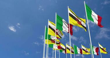 Brunei and Italy Flags Waving Together in the Sky, Seamless Loop in Wind, Space on Left Side for Design or Information, 3D Rendering video