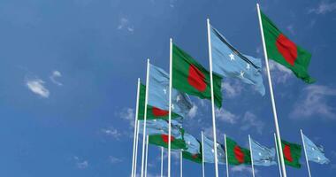 Federated States of Micronesia and Bangladesh Flags Waving Together in the Sky, Seamless Loop in Wind, Space on Left Side for Design or Information, 3D Rendering video