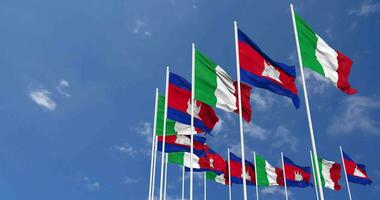 Cambodia and Italy Flags Waving Together in the Sky, Seamless Loop in Wind, Space on Left Side for Design or Information, 3D Rendering video