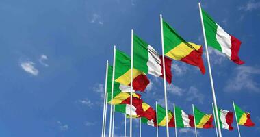 Congo and Italy Flags Waving Together in the Sky, Seamless Loop in Wind, Space on Left Side for Design or Information, 3D Rendering video